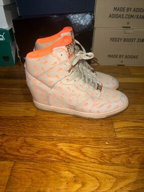 Nike Women’s Wedge Sneakers in Beige with Neon Orange Accents